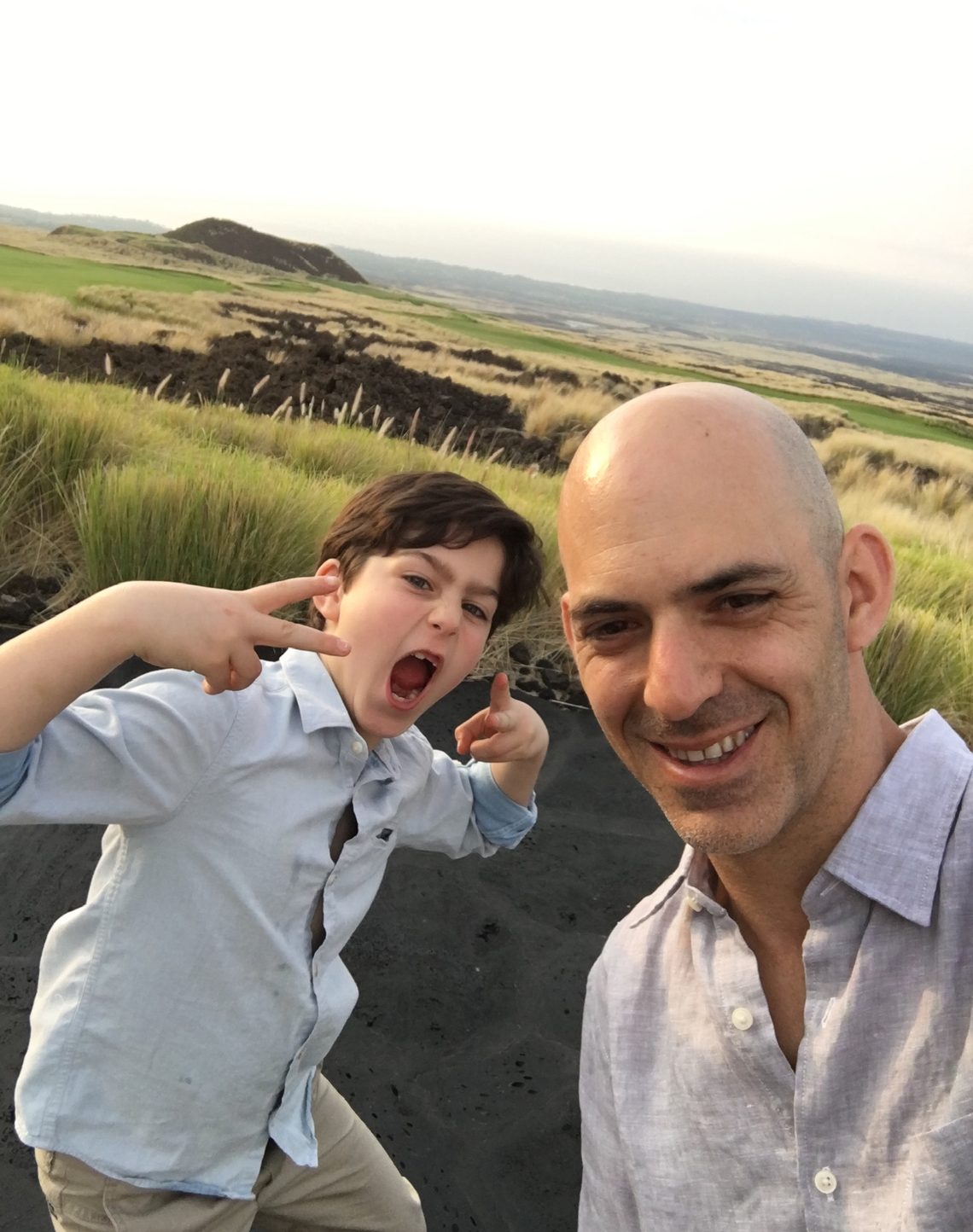 Eliot Abramson as a boy outdoors with a family member.