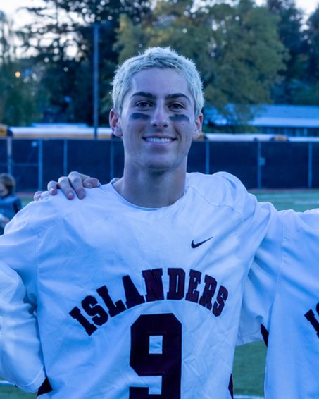 Eliot Abramson in his lacrosse jersey on the field.